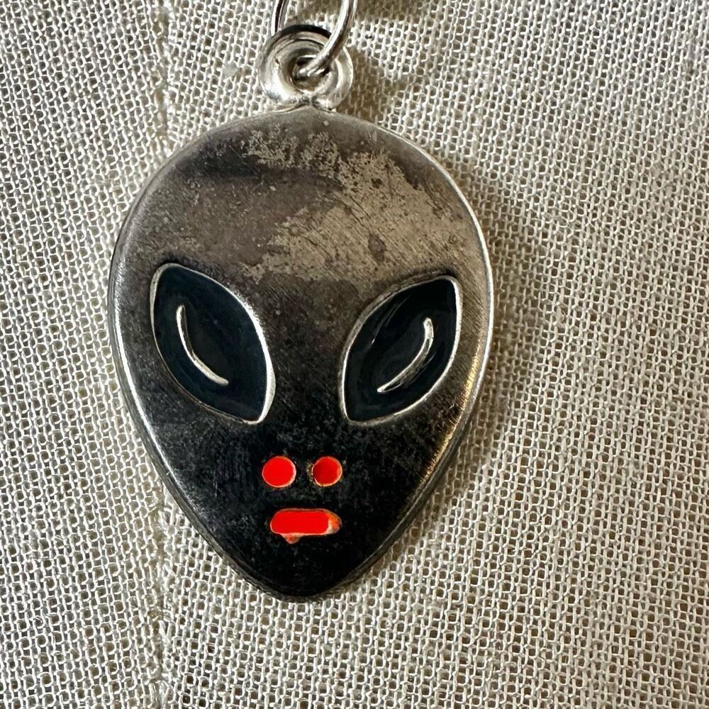 Alien pendant necklace on cord